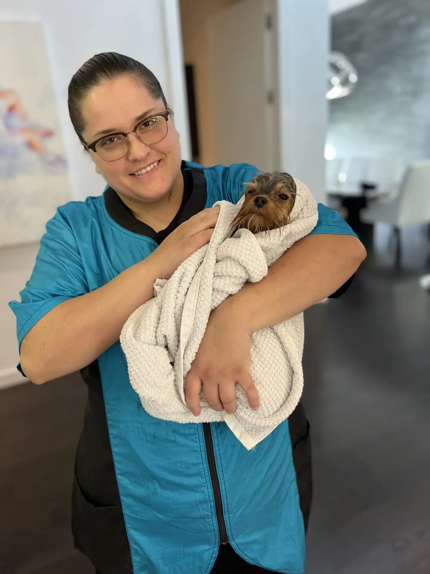 Jill caring for a dog during an in-home groom